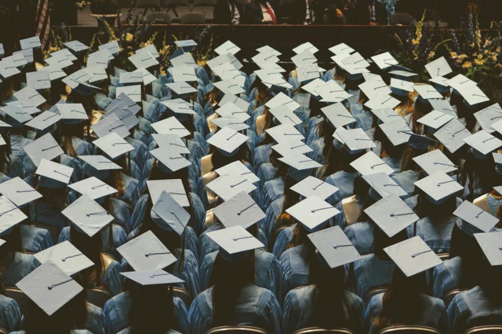 Graduation caps tossed into the air at a ceremony