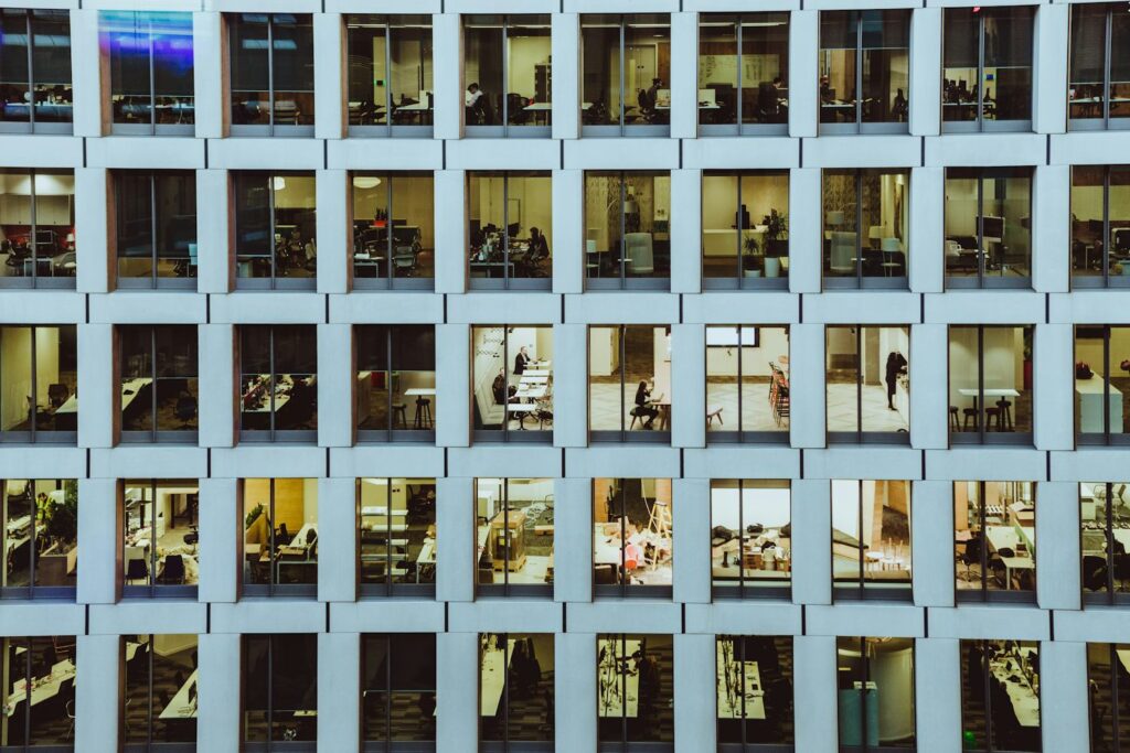 People inside a modern high-rise office building